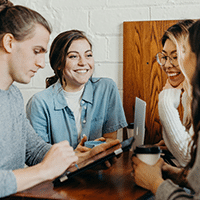 Students communicating effectively | Photo by Brooke Cagle on Unsplash
